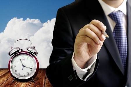 investor by an alarm clock