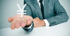 man holding japanese yen currency symbol